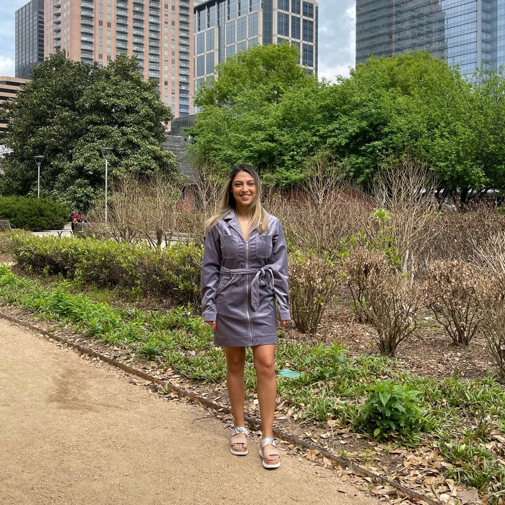Purple zip up dress.